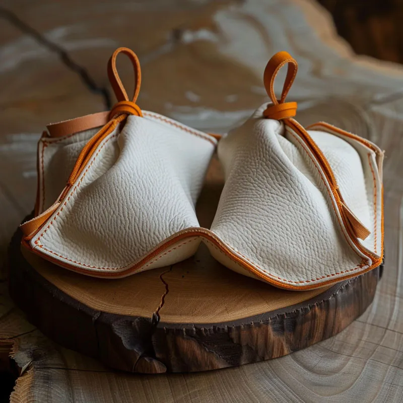 Cad iad na buntáistí a bhaineann le pouch jewelry leathair a úsáid?